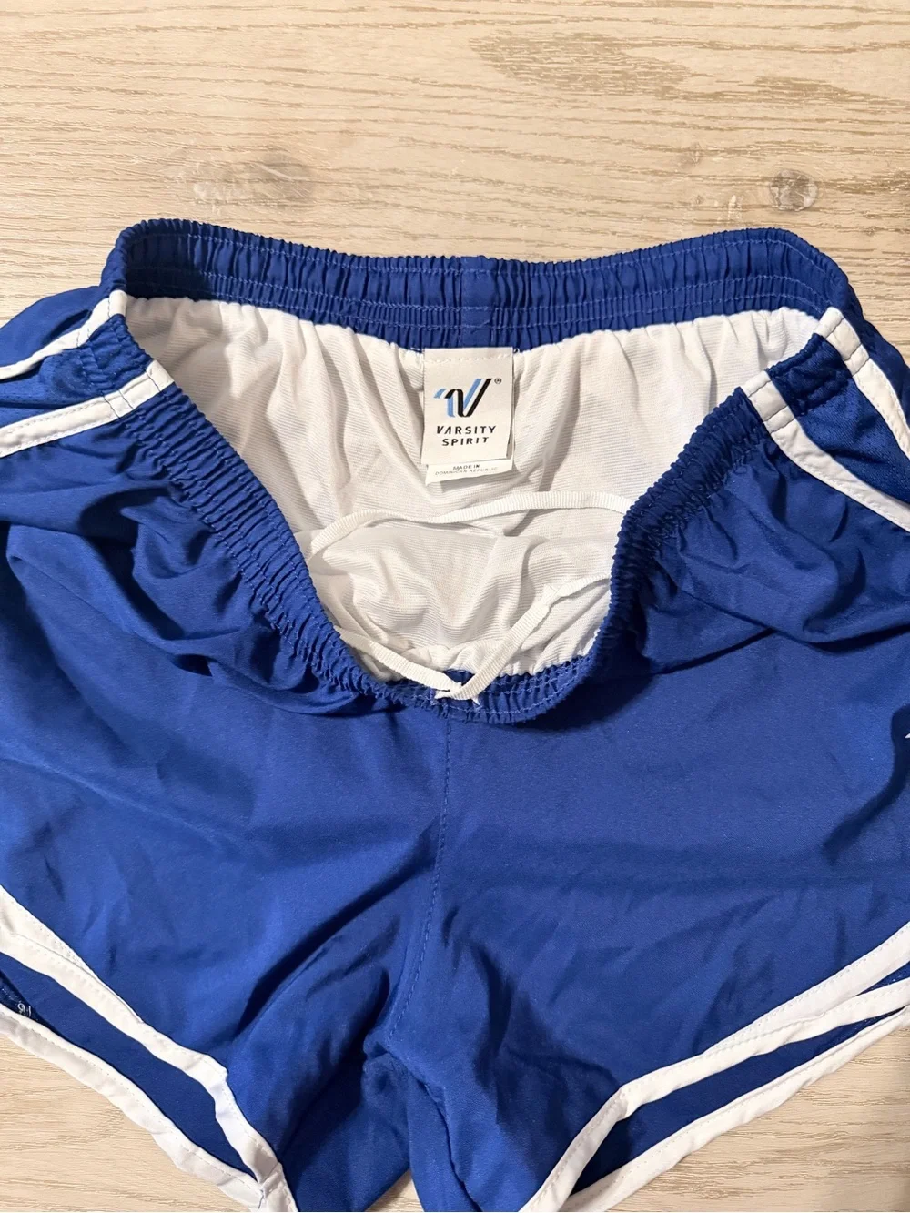 Varsity navy blue cheer Shorts with White Trim size medium